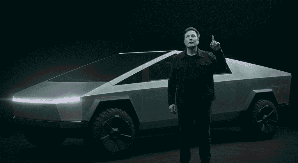 ¿Quién es Elon Musk? Vida, empresas e impacto del empresario más polémico 7 Elon Musk presenta el Tesla Cybertruck. Imagen de Elon Musk junto al innovador coche eléctrico Tesla Cybertruck. Fotografía de automóvil futurista y emprendimiento tecnológico.